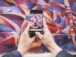 Mobile phone and artwork to create visual appealing websites